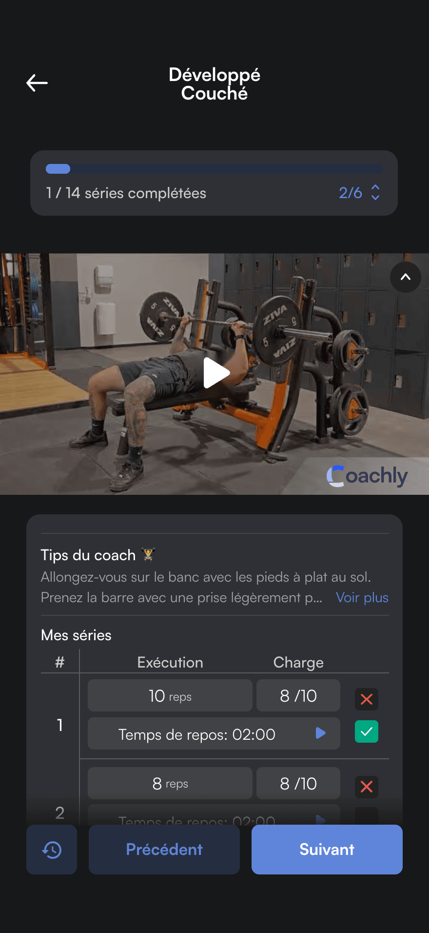 Session in progress in the athlete app: bench press video, coach tips and sets to tick off, 1 of 14 sets completed.