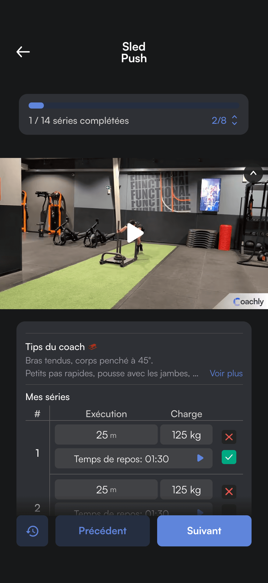 Séance en cours dans l’app sportif : sled push en vidéo, conseils du coach et séries de 25 m à 125 kg, 1 série sur 14 complétée.