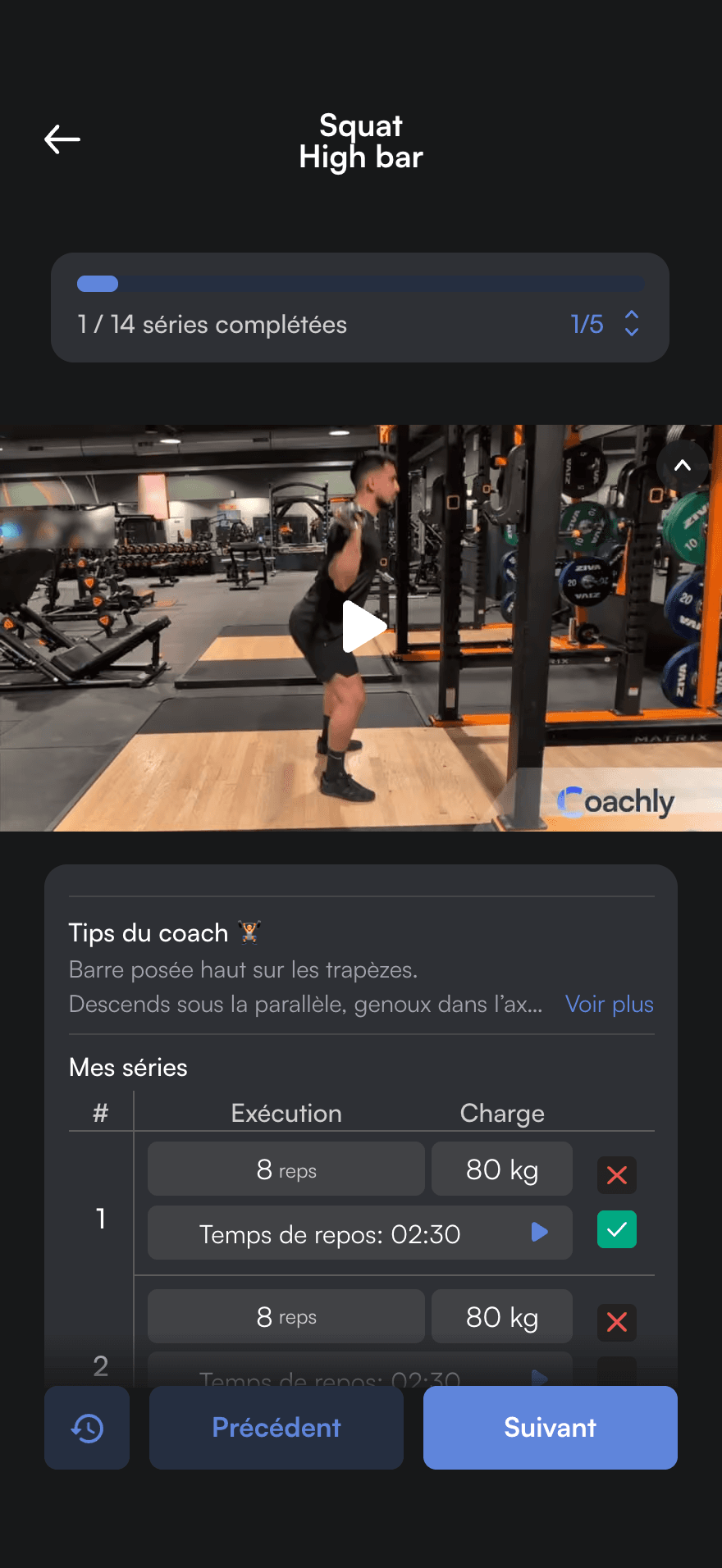 Séance en cours dans l’app sportif : squat high bar en vidéo, conseils du coach et séries à 80 kg, 1 série sur 14 complétée.